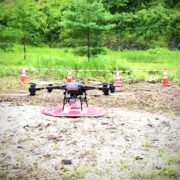 山岳鉄塔資材ドローン搬出